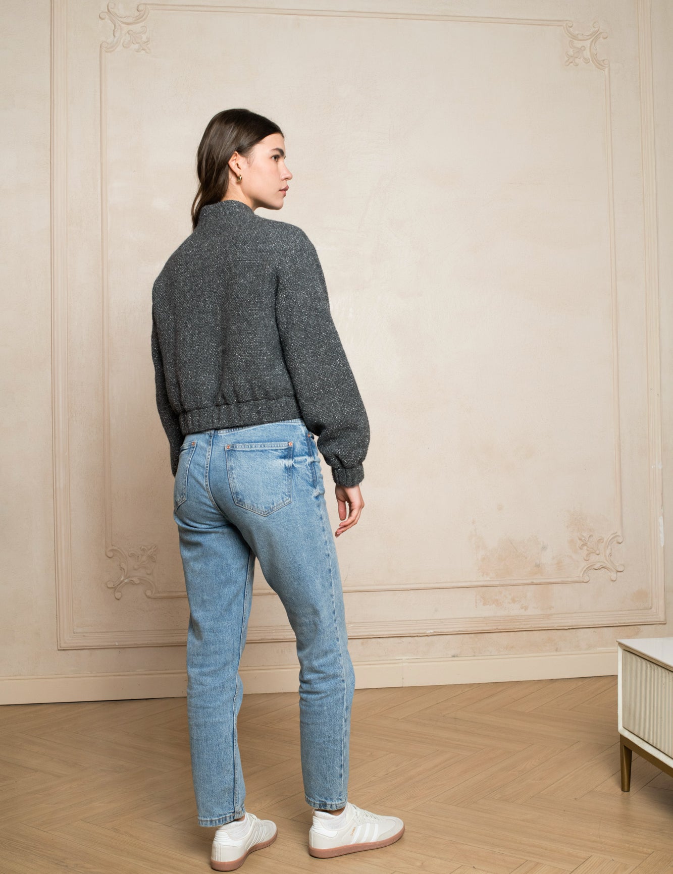 Grey bomber jacket with zipper in slight glitter boucle fabric with side pockets -side view