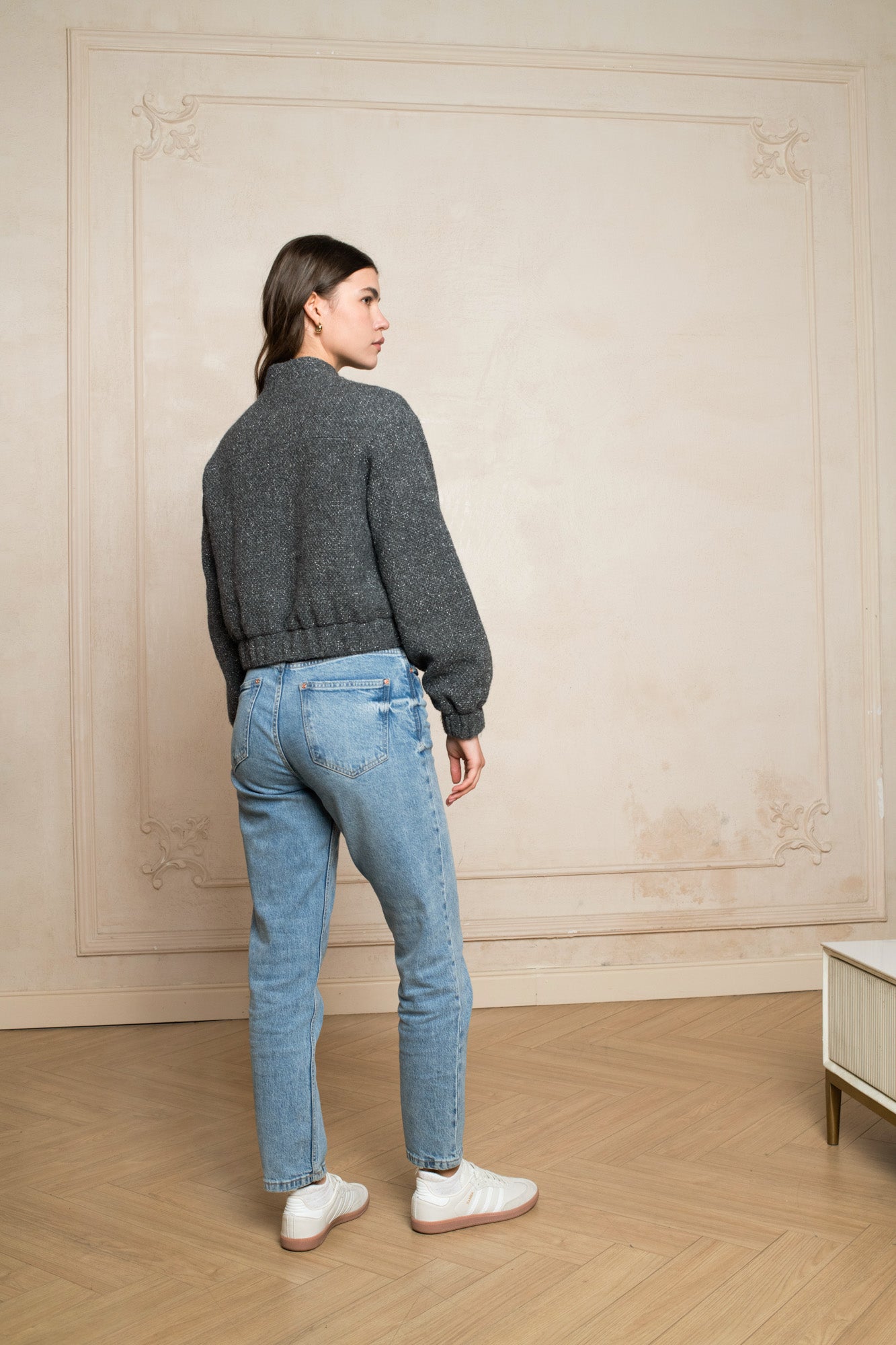 Grey bomber jacket with zipper in slight glitter boucle fabric with side pockets -side view