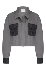 Grey punta di roma jacket with boucle front pockets and cuff - front view