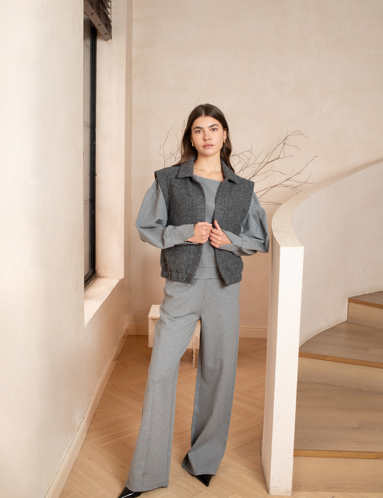 Grey sleeveless gilet women boucle with a collar, side pockets, no zipper - front view 